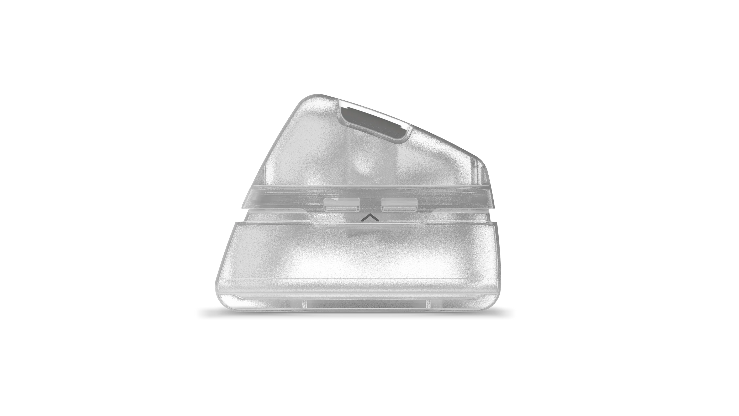 Clear plastic object with a small black component on a white background
