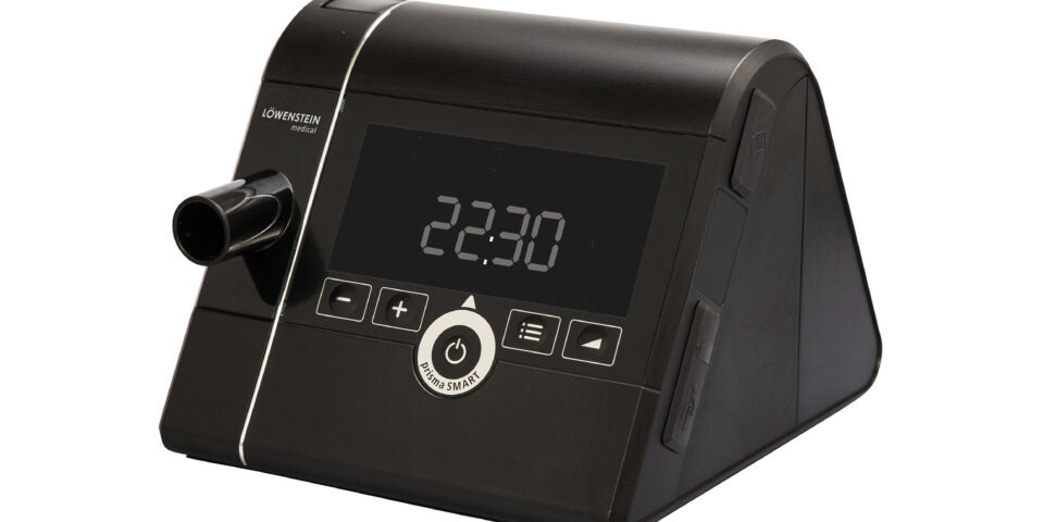 Black electronic device with digital display on a white background